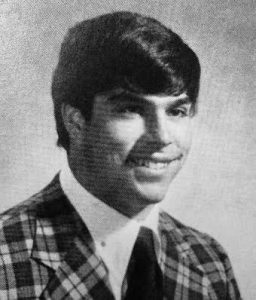 Headshot of young John Powers